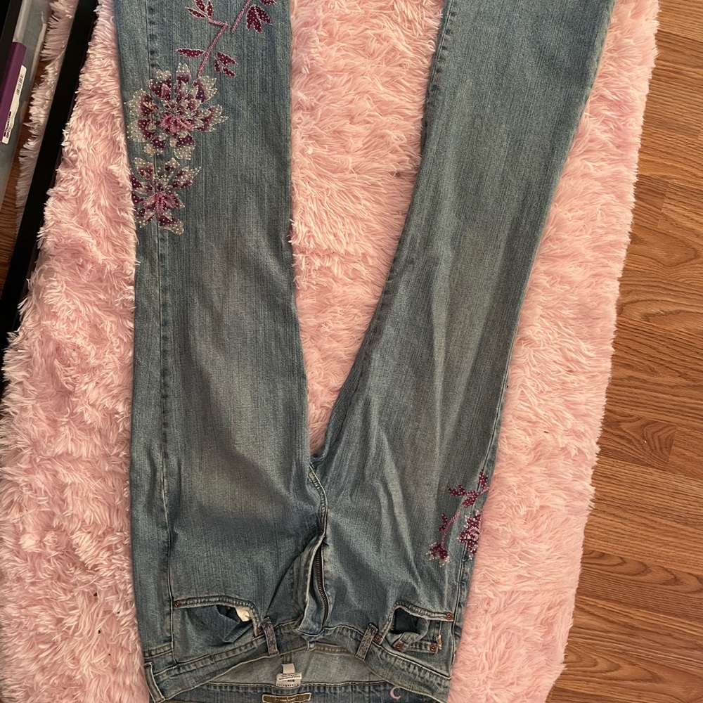90s inspired embroidered jeans